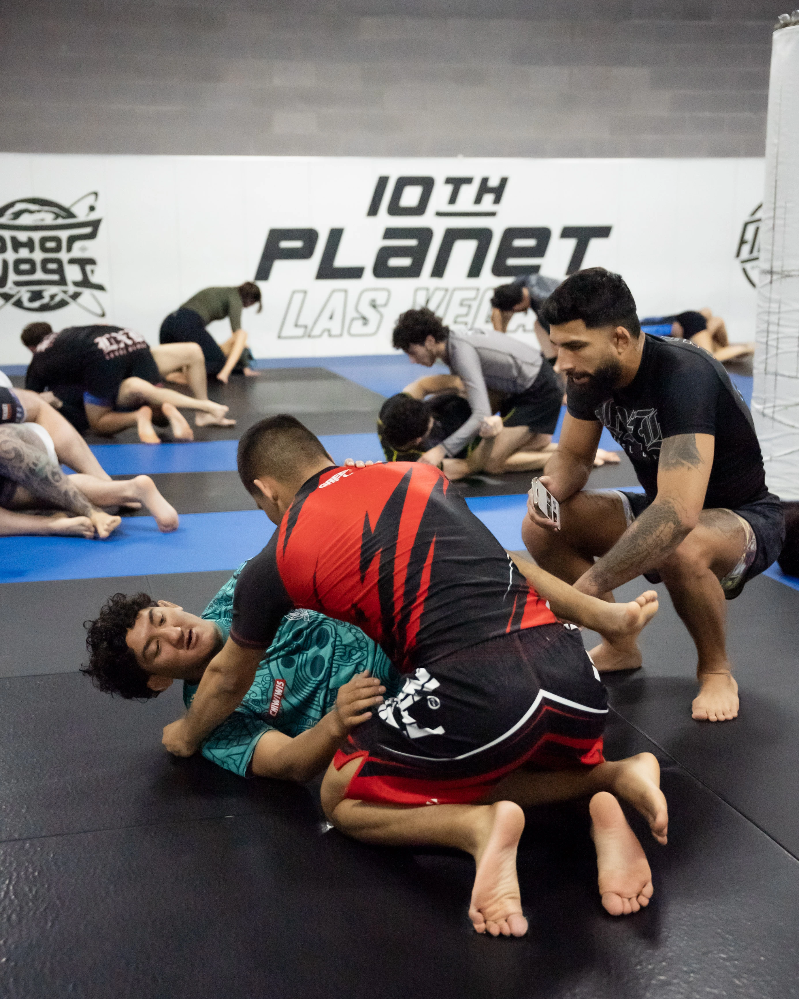 Instructor coaching at 10th Planet Las Vegas